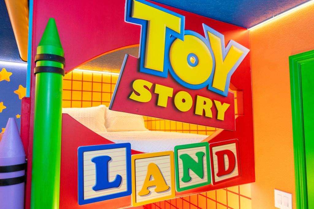 Toy Story Themed bedroom w/ 2 full beds and TV (hidden passage to the other themed bedroom).
