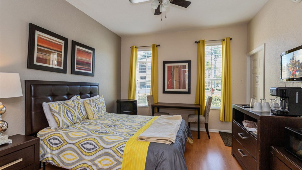 In Law Suite with Yellow Accents
Bright guest room featuring a queen bed, stylish yellow-and-gray bedding.
