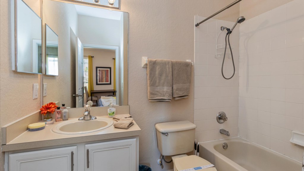 Guest Bathroom
Second full bathroom with tub/shower combo, clean vanity, and soft towels.