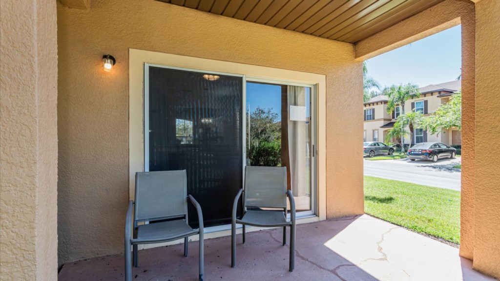 Ground-Level Patio
Private patio space with seating, offering easy access to the outdoors and community views.