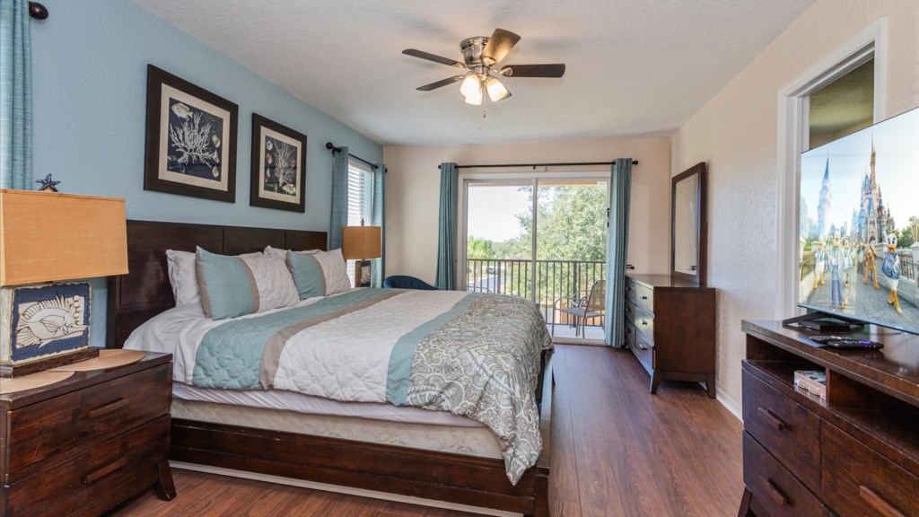 Master Bedroom with view.
Spacious master suite with a king bed, elegant décor, and a flat-screen TV.