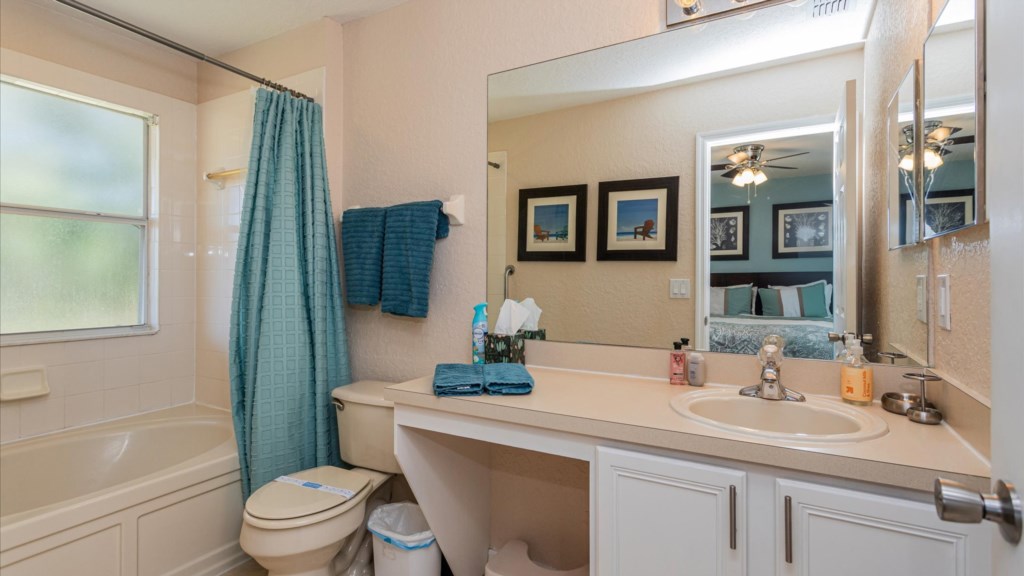 Master Bathroom
En-suite bathroom with a wide vanity, large mirror, and thoughtful touches.