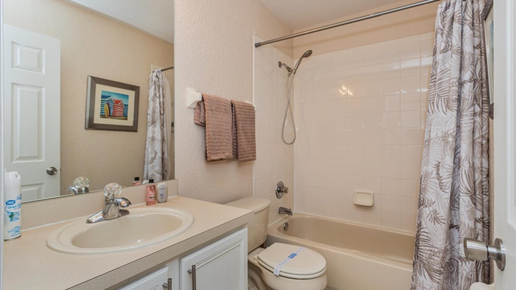 Guest Bathroom
Full bathroom with a combination shower/tub, fresh towels, and a wide vanity for all your essentials.