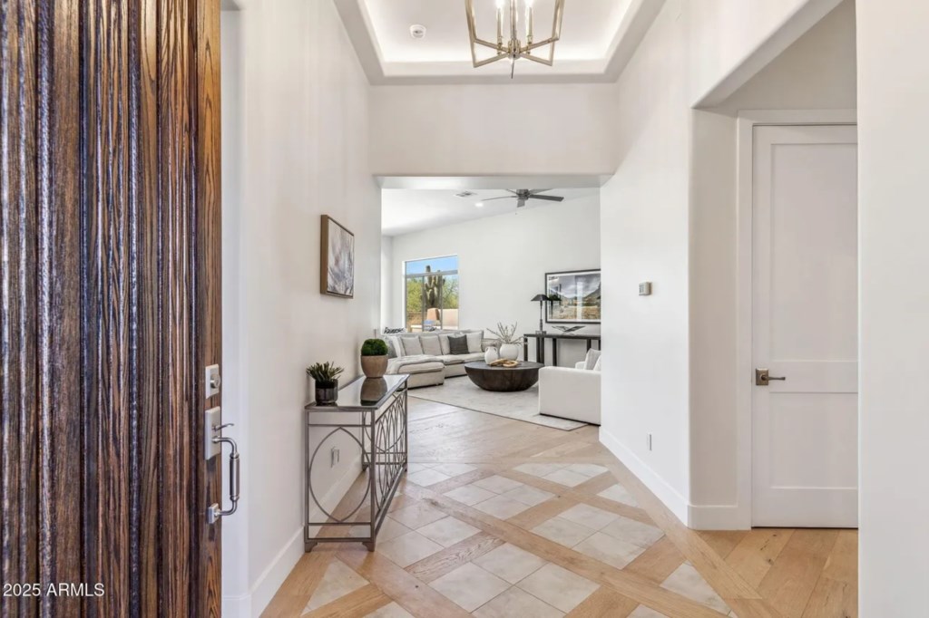 Welcoming entryway leading to a bright and spacious living area.