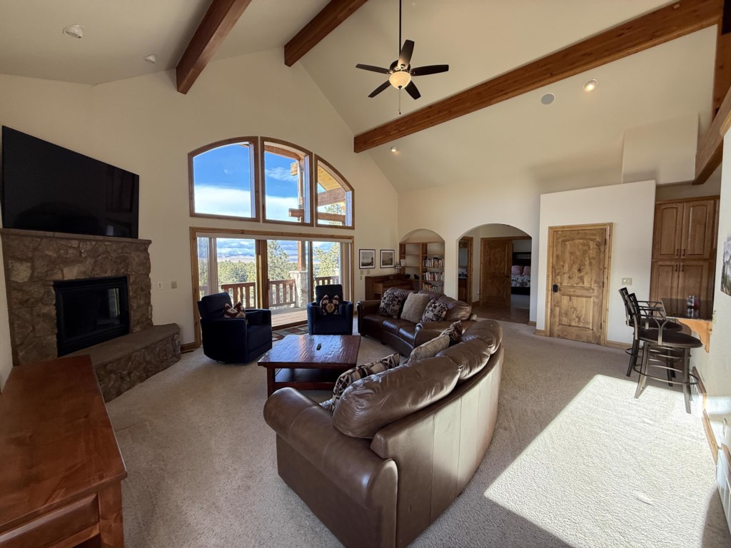 Spacious living room with large screen tv and amazing views of Eleven Mile Reservoir
