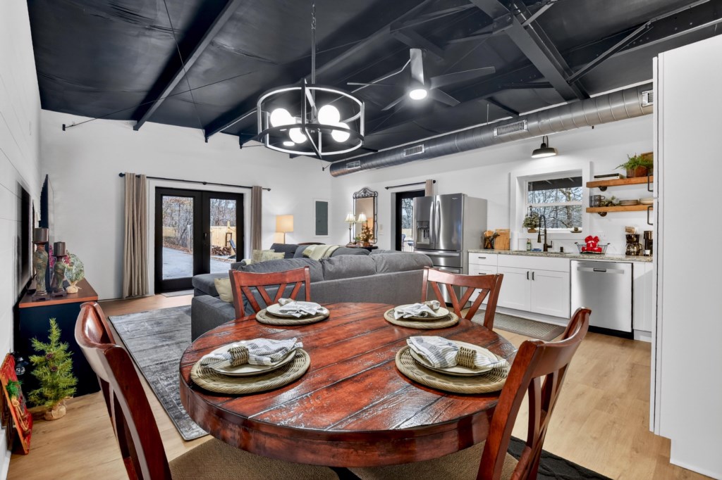 Enjoy your meal or play a game at the 4 person dining table