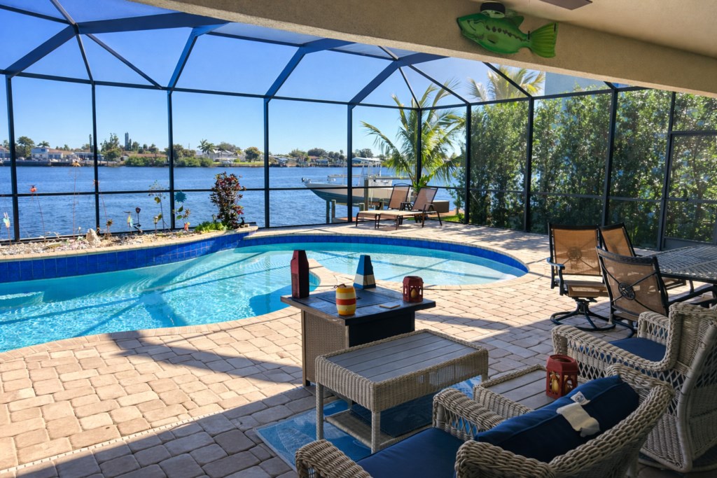 Relaxing by pool deck 