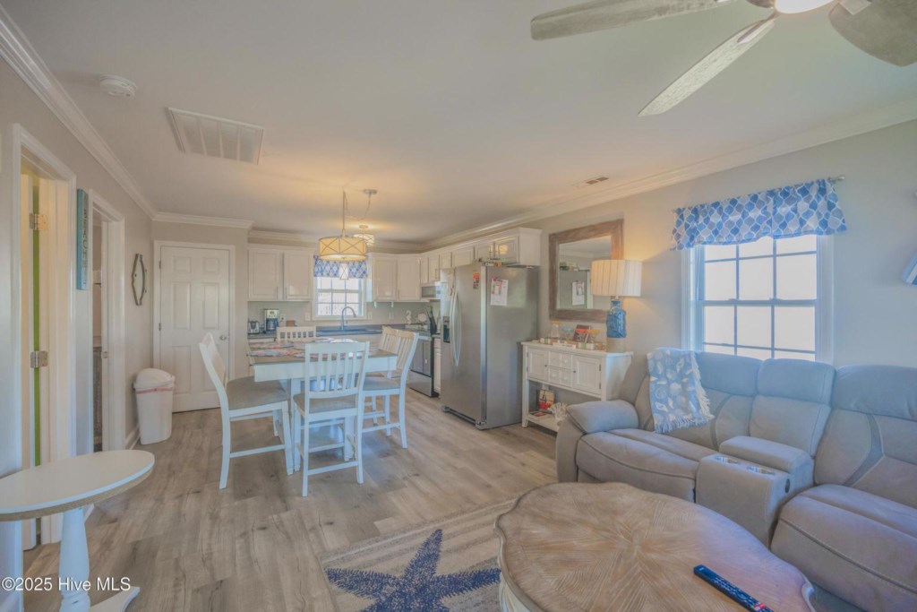 Living, dining, and kitchen area