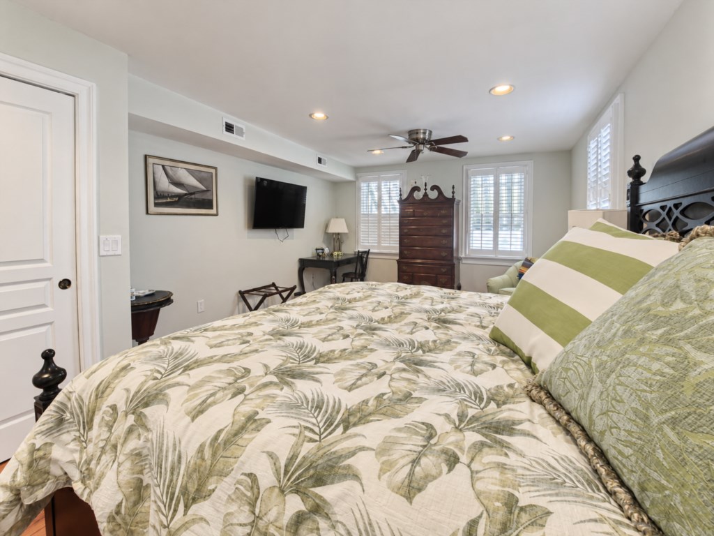 Relax and unwind in this inviting  Primary King bedroom after a day exploring Annapolis.