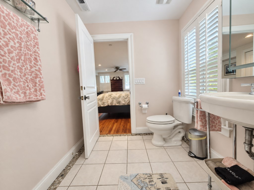 Full bath with walk in shower is attached to the primary suite