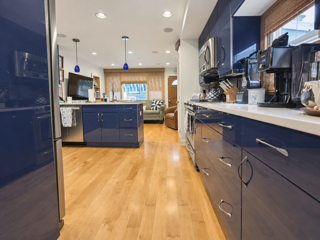 Beautifully updated kitchen with generous counter space and everything you need to prepare meals during your stay.