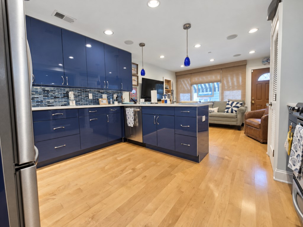 Beautifully updated kitchen with generous counter space and everything you need to prepare meals during your stay.