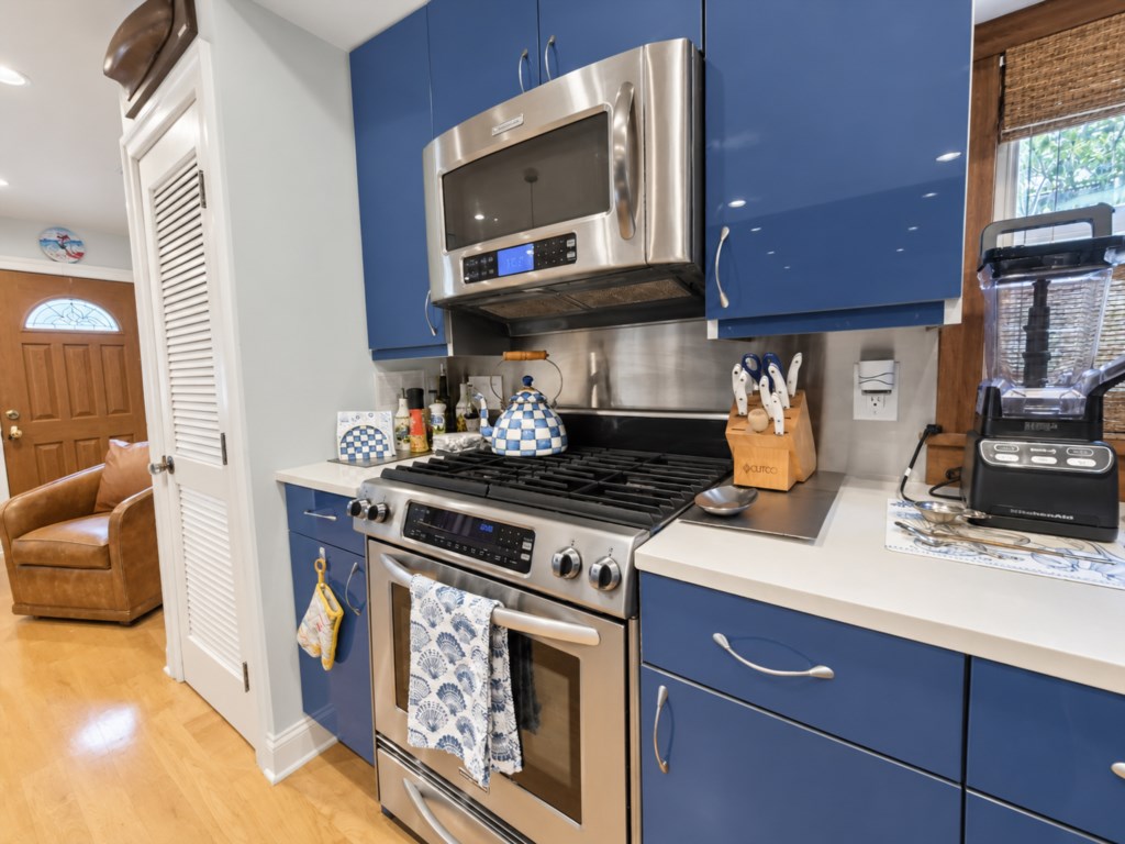 Beautifully updated kitchen with generous counter space and everything you need to prepare meals during your stay.