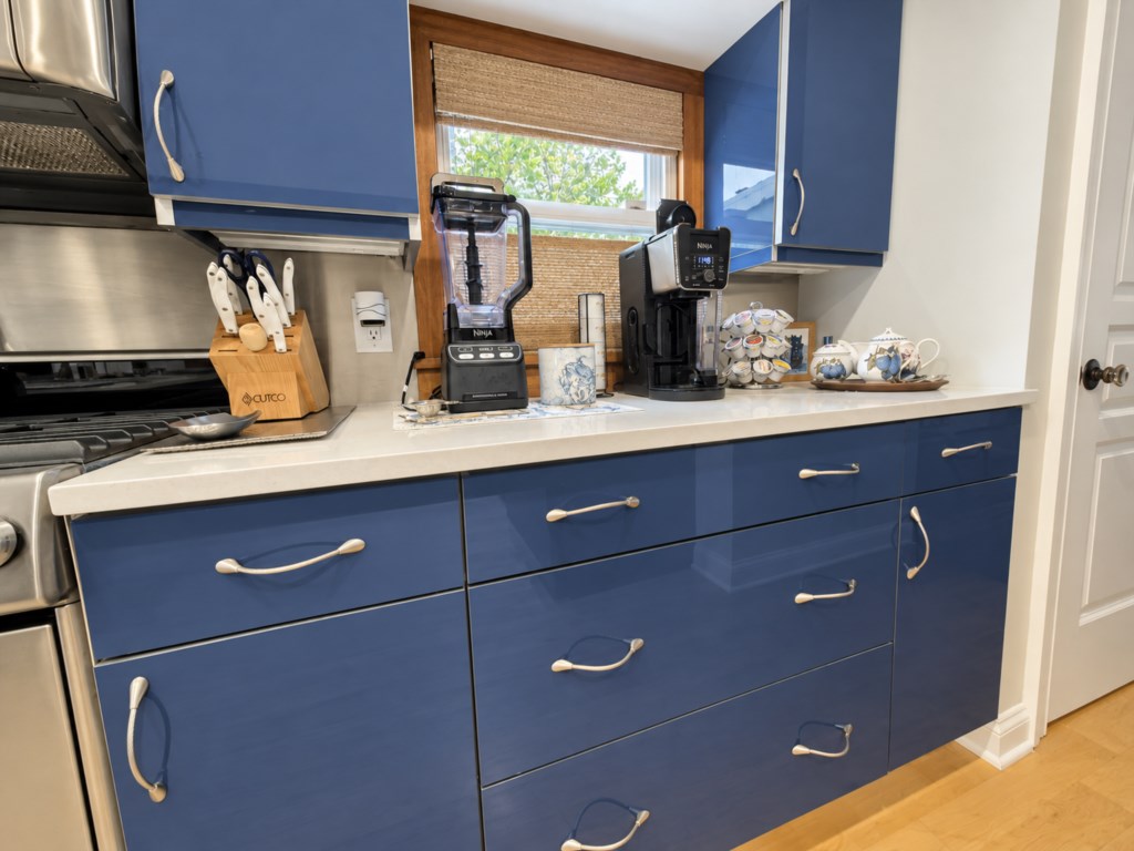 Beautifully updated kitchen with generous counter space and everything you need to prepare meals during your stay.