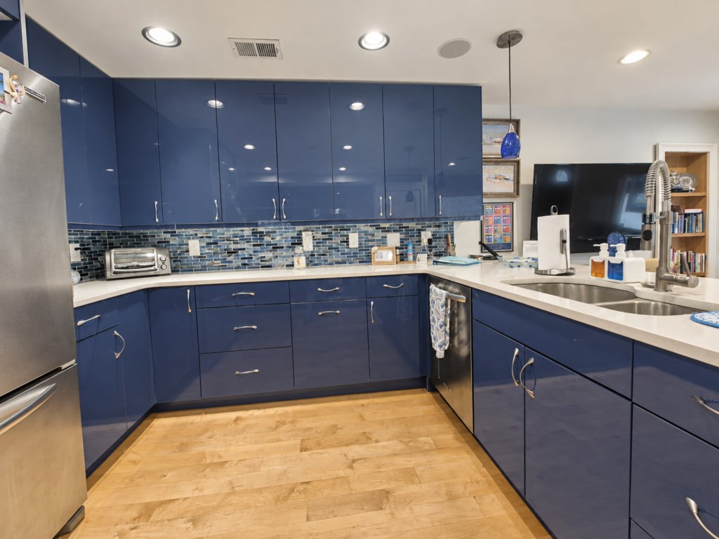 Beautifully updated kitchen with generous counter space and everything you need to prepare meals during your stay.