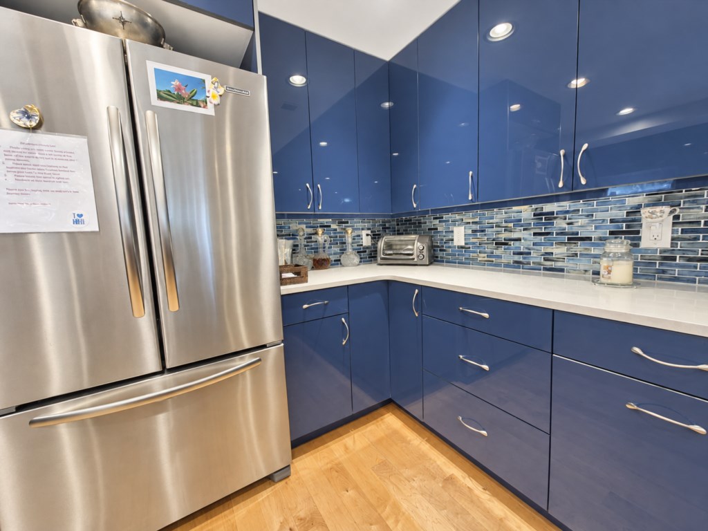 Beautifully updated kitchen with generous counter space and everything you need to prepare meals during your stay.