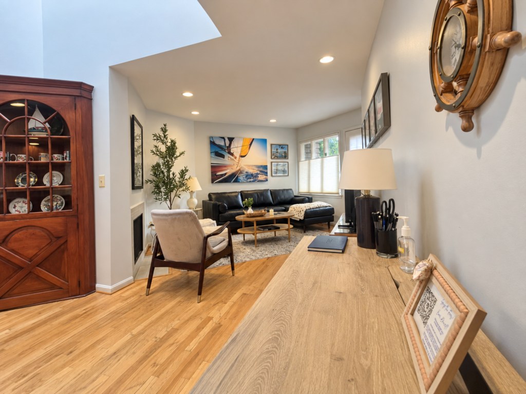 Main living and dining spaces with wood flooring.