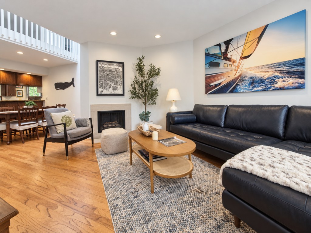 Living room seating beside the fireplace.