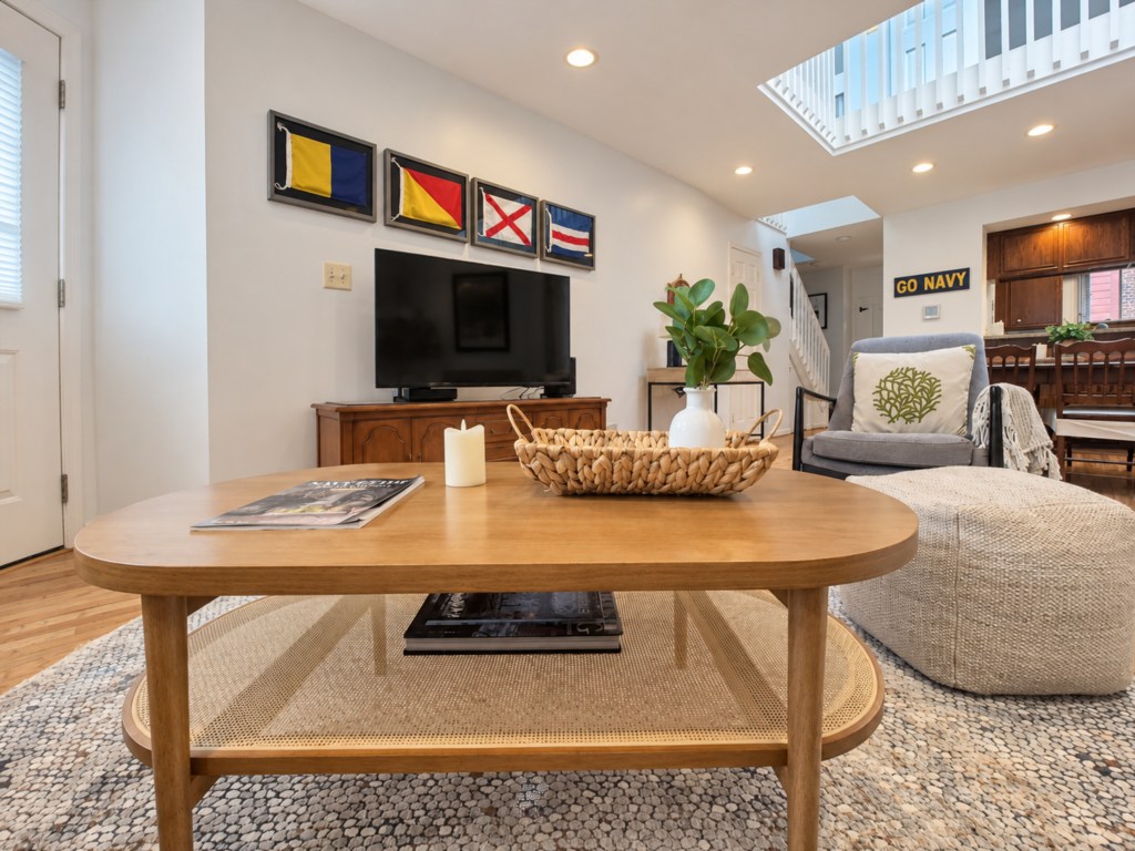 Coffee table and TV area in the main living space.