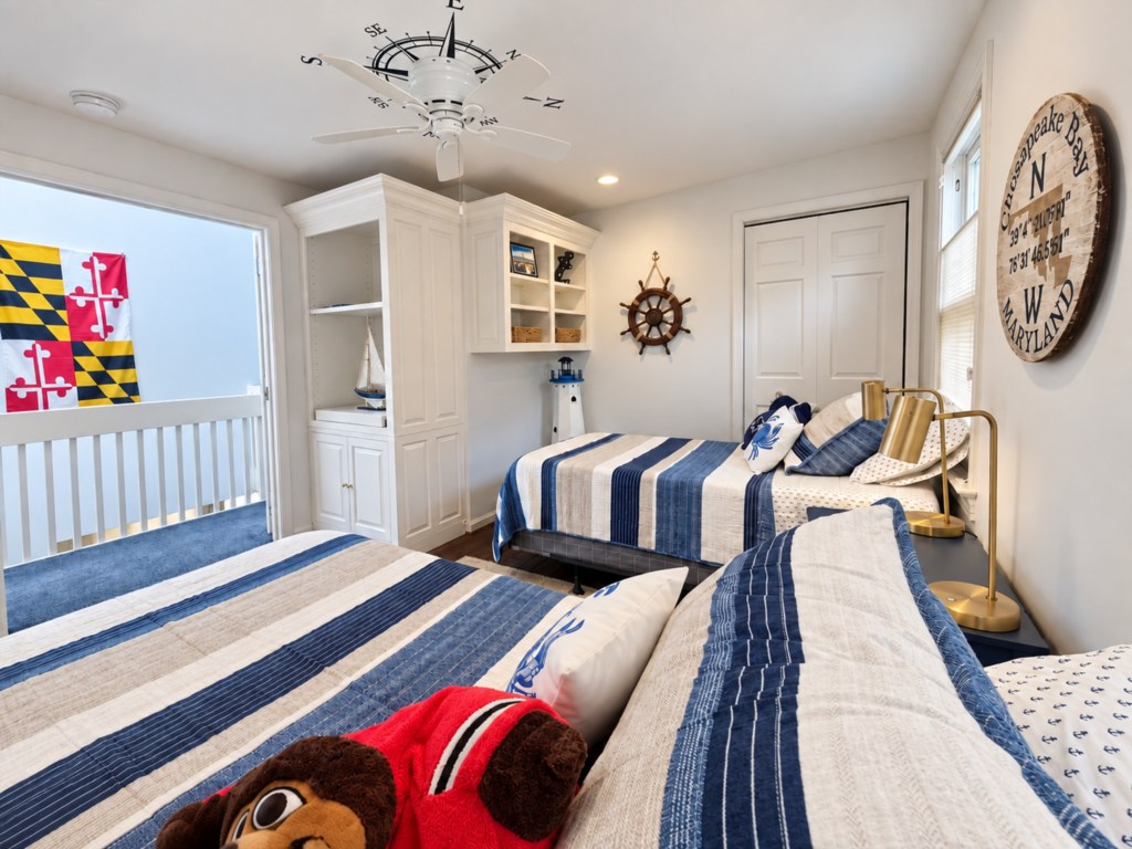Twin beds with coordinated blue-and-white bedding.