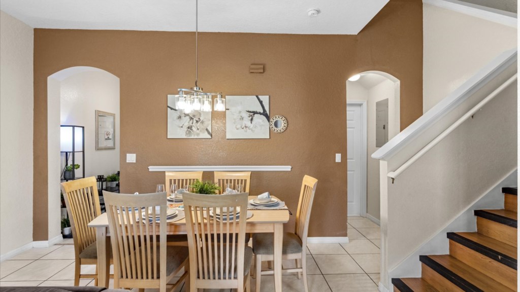 Living Room & Dining Area
Open-plan living and dining area with a large family dining table and cozy seating.