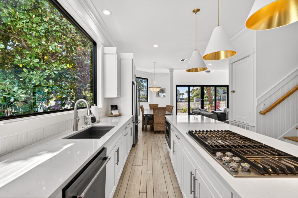Kitchen With Island Bar and Modern Amenities