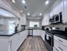 Gourmet Kitchen with Granite Countertops and Stainless Steel Appliances