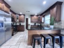Open Concept Custom Kitchen
Kitchen with granite countertops and stainless steel appliances