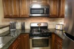 Custom Kitchen with Granite Countertops view 2
Custom Kitchen with granite countertops and Stainless Steel Appliances