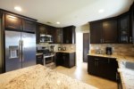 Upgraded Custom Kitchen with Stainless Steel Appliances
Has Granite Countertops