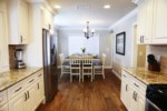 Partial Open Concept Custom Kitchen view into Dining Room
