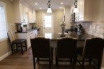 Custom Kitchen with Stainless Steel Appliances and Granite Countertops view 2
Kitchen Bar Top seating for 4