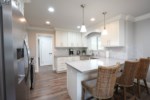 Custom Kitchen with Stainless Steel Appliances
Open Concept Kitchen and Dining Room