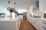 Custom Open Concept Kitchen with Stainless Steel Appliances
The Kitchen Island has seating for 4