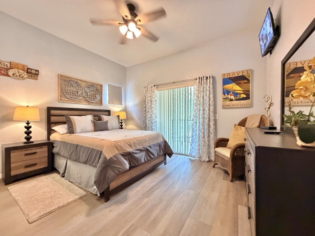 Spacious primary suite featuring a comfortable queen-size bed.