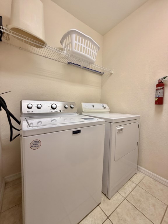 Full-size washer and dryer for added convenience.
