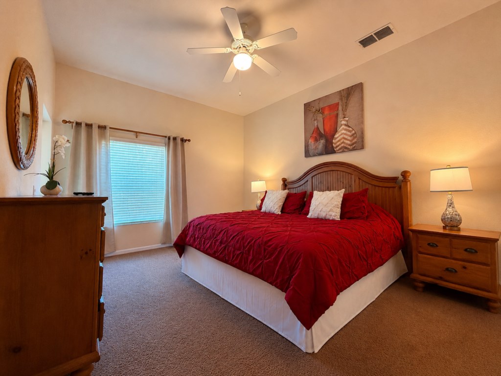 Wake up refreshed in the peaceful primary bedroom.

