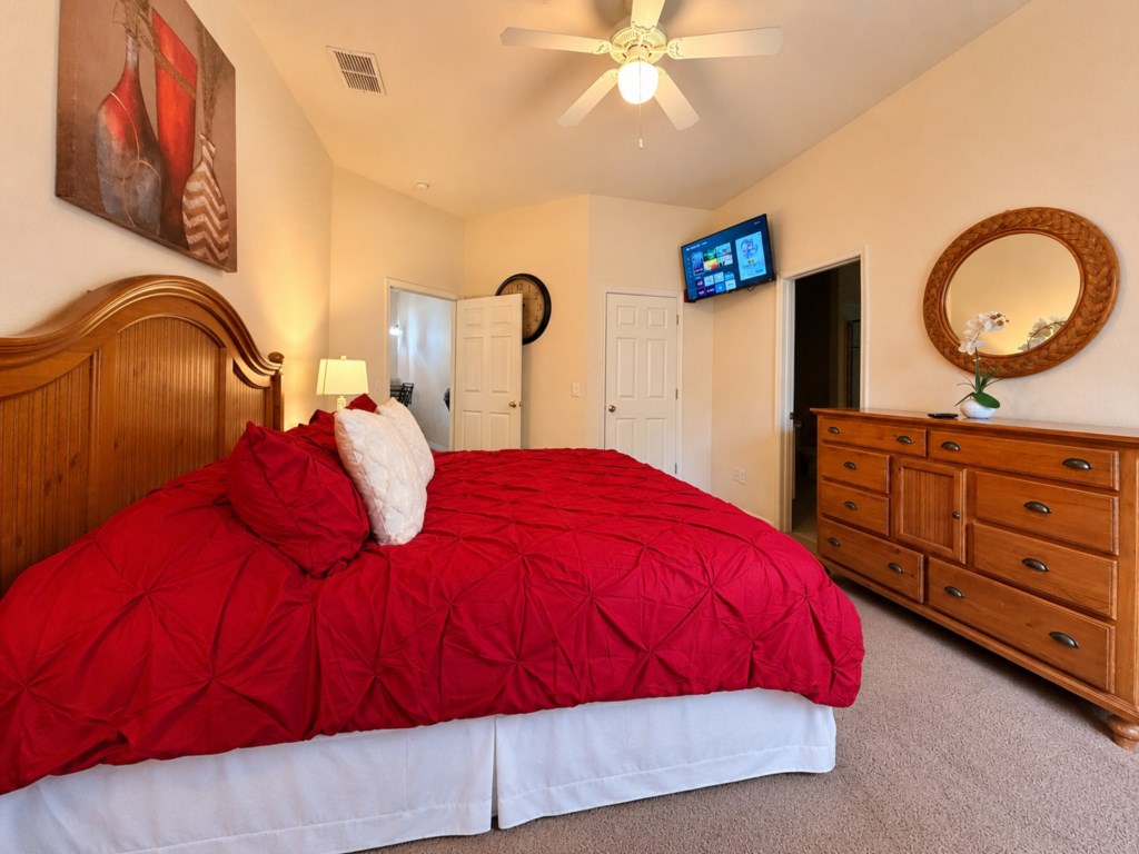Wake up refreshed in the peaceful primary bedroom.
