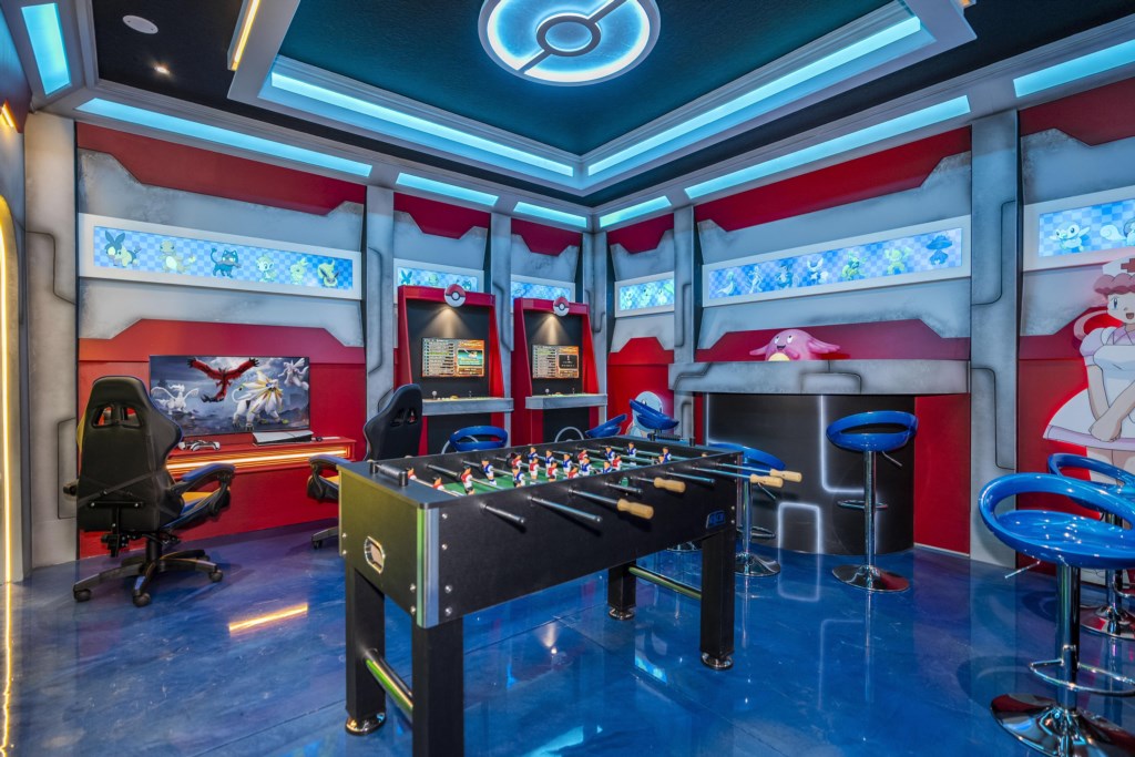 Game room w/ foosball, arcade games, hockey table.