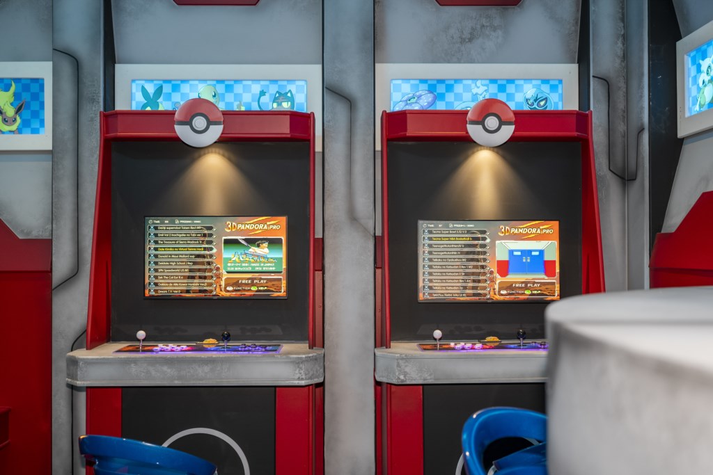 Game room w/ foosball, arcade games, hockey table.