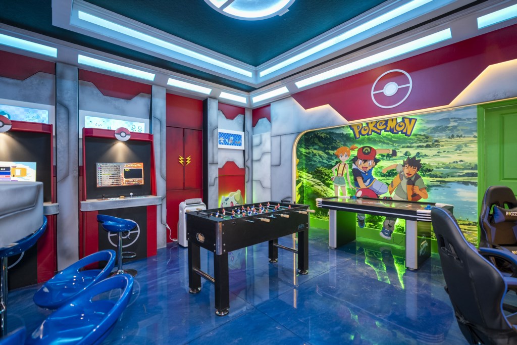 Game room w/ foosball, arcade games, hockey table.
