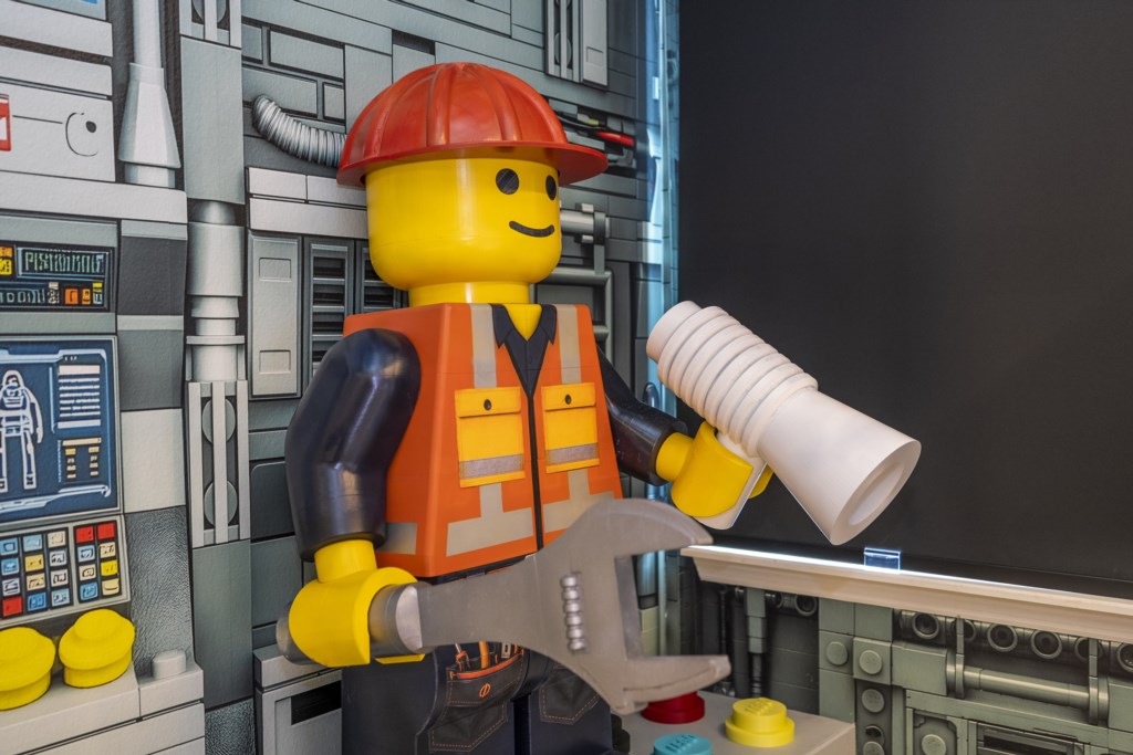 LEGO Themed bedroom w/ TV and full over full beds.
