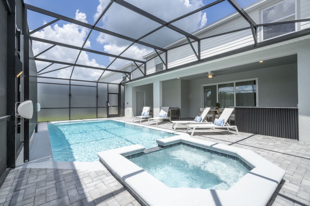Pool area w/ LED screen, privacy screen.