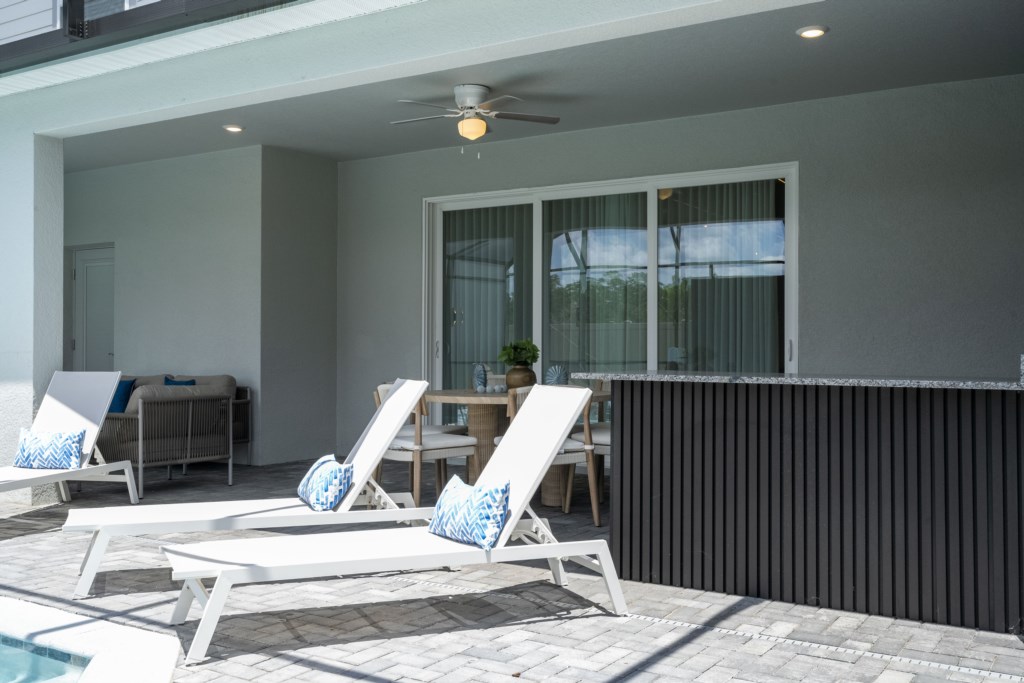 Pool area w/ LED screen, privacy screen.
