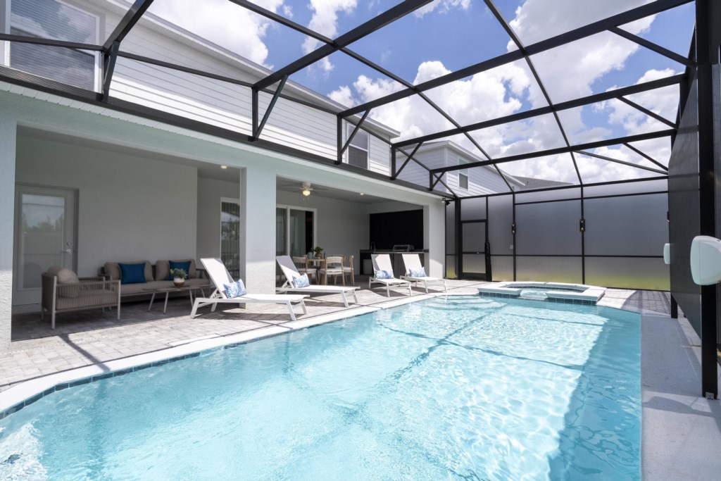 Pool area w/ LED screen, privacy screen.