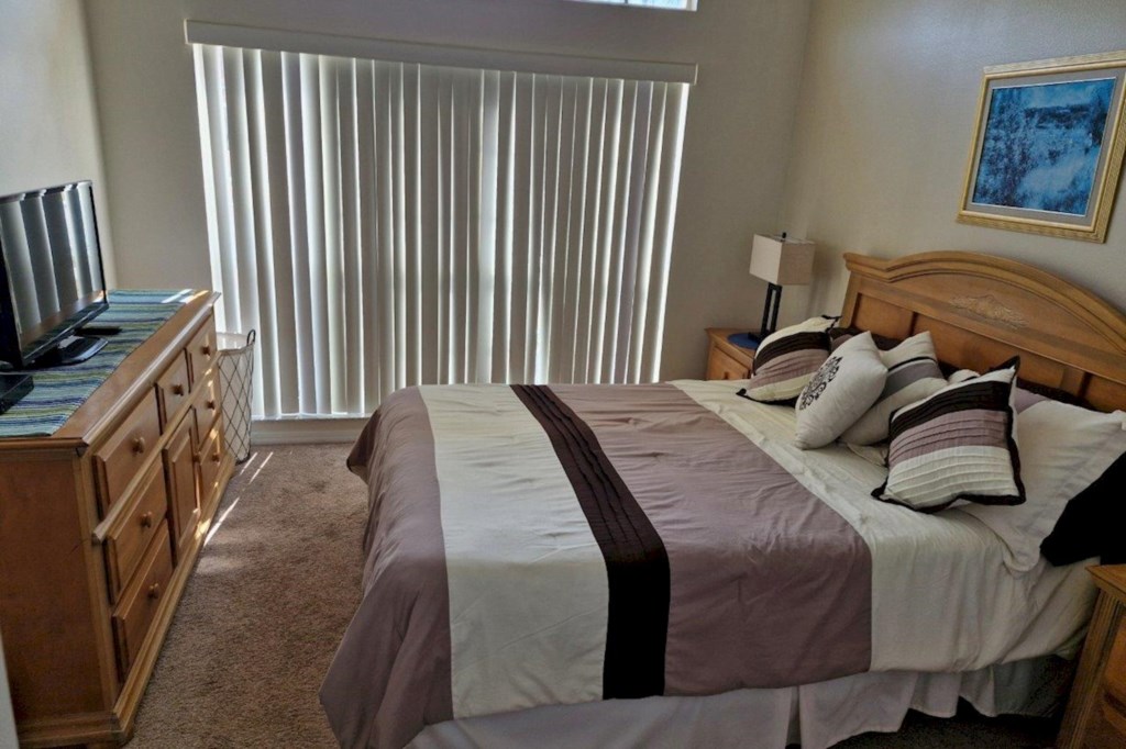 Spacious second master suite located on the ground floor, offering convenient access and private amenities