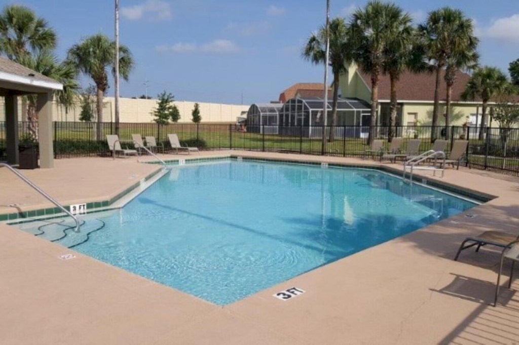 Enjoy a refreshing dip in our sparkling community swimming pool, the perfect spot to relax and soak up the sun 