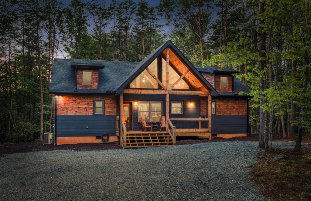 Charming woodland cabin with a cozy porch for relaxing in nature.