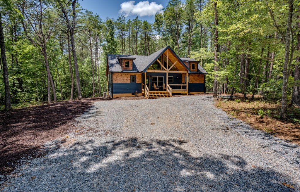 Charming cabin retreat surrounded by serene woodland, perfect for a peaceful getaway.