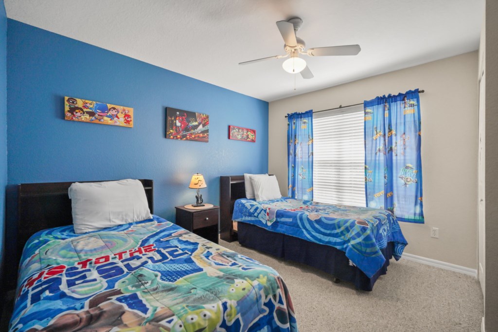 Bedroom # 3 upstairs with 2 Twin size beds in a Disney Toy Story Themed.